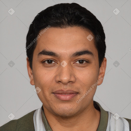 Joyful latino young-adult male with short  black hair and brown eyes