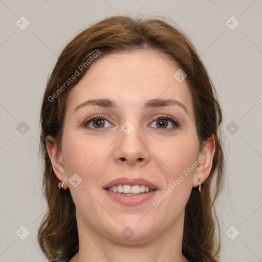 Joyful white young-adult female with medium  brown hair and grey eyes