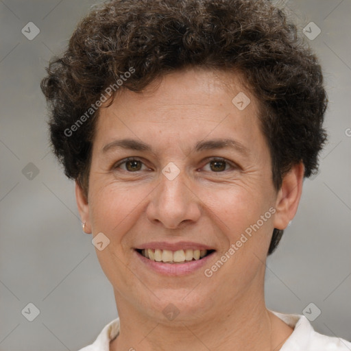 Joyful white adult female with short  brown hair and brown eyes