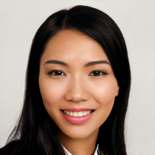 Joyful white young-adult female with long  black hair and brown eyes