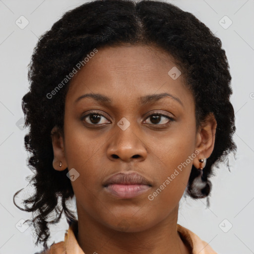 Neutral black young-adult female with short  brown hair and brown eyes