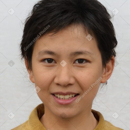 Joyful asian young-adult female with short  brown hair and brown eyes