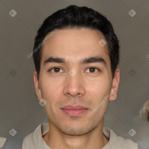 Joyful white young-adult male with short  black hair and brown eyes