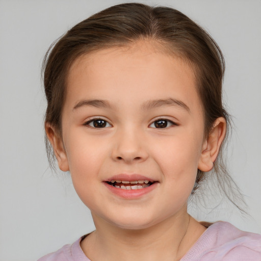 Joyful white child female with medium  brown hair and brown eyes