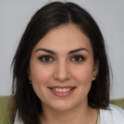 Joyful white young-adult female with medium  brown hair and brown eyes