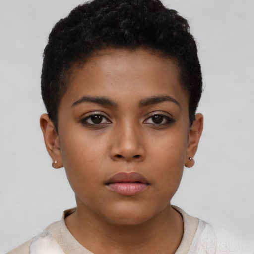 Neutral black child female with short  brown hair and brown eyes