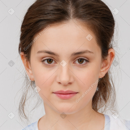 Joyful white child female with medium  brown hair and brown eyes