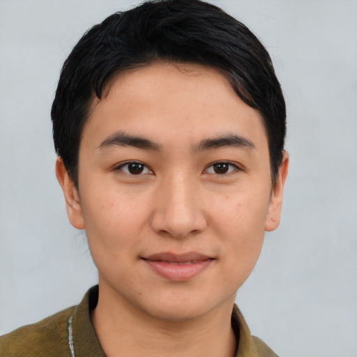Joyful latino young-adult male with short  brown hair and brown eyes