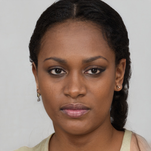 Neutral black young-adult female with long  black hair and brown eyes