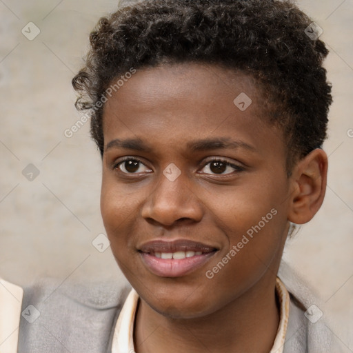 Joyful black young-adult male with short  brown hair and brown eyes