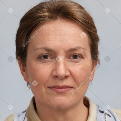 Joyful white adult female with short  brown hair and grey eyes