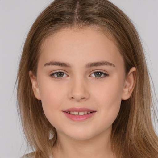 Joyful white child female with long  brown hair and brown eyes