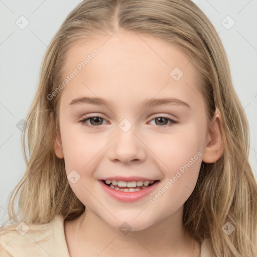 Joyful white child female with long  brown hair and brown eyes