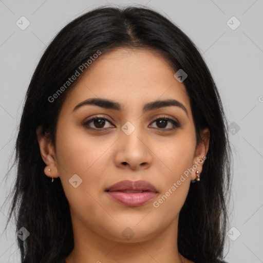 Joyful latino young-adult female with long  brown hair and brown eyes