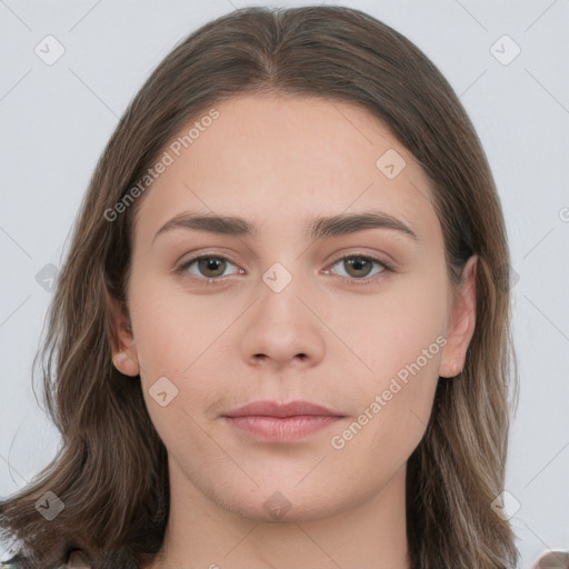 Neutral white young-adult female with long  brown hair and brown eyes