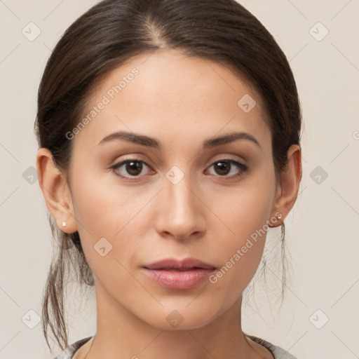 Neutral white young-adult female with medium  brown hair and brown eyes