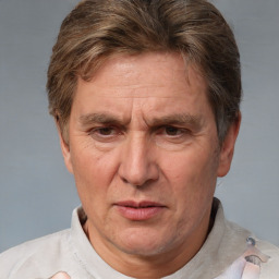 Joyful white middle-aged male with short  brown hair and brown eyes