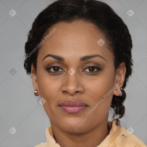 Joyful latino adult female with medium  brown hair and brown eyes