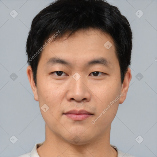 Neutral asian young-adult male with short  black hair and brown eyes