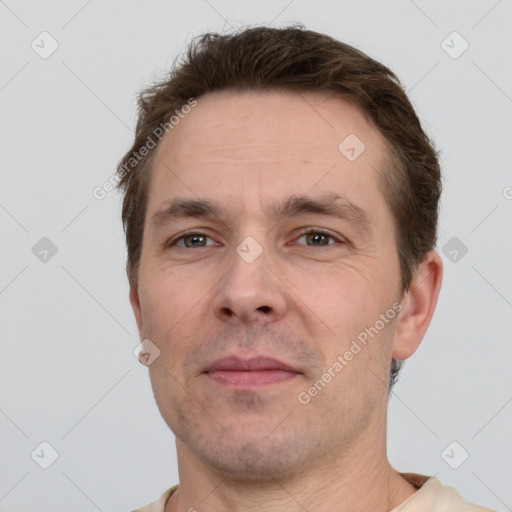 Neutral white adult male with short  brown hair and grey eyes