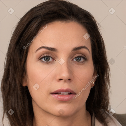 Neutral white young-adult female with long  brown hair and brown eyes