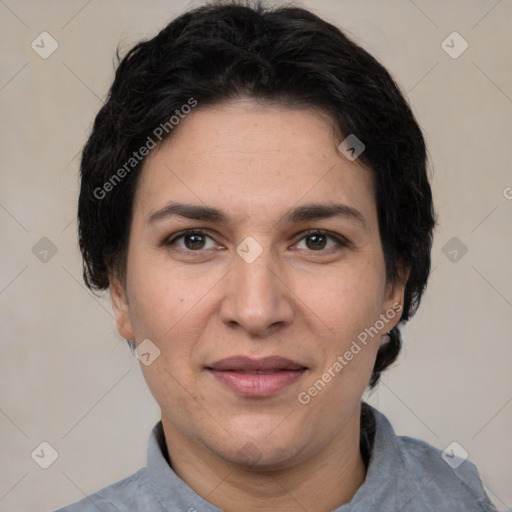 Joyful white adult female with short  brown hair and brown eyes