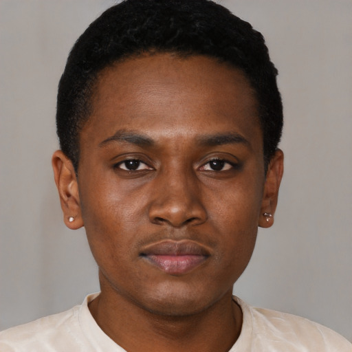 Neutral black young-adult male with short  black hair and brown eyes