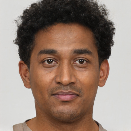 Neutral latino young-adult male with short  brown hair and brown eyes