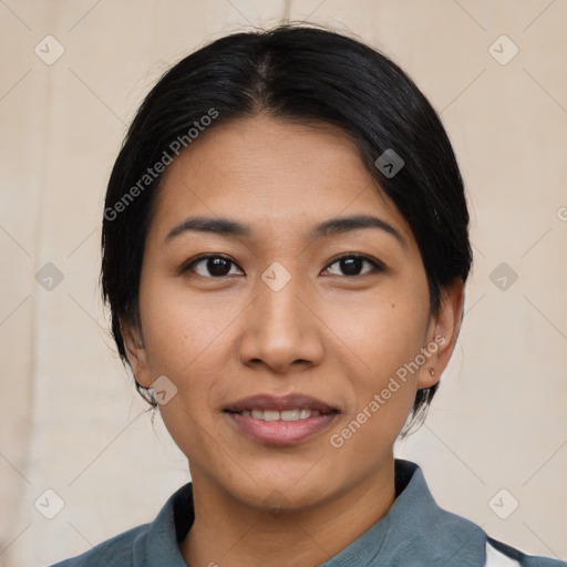 Joyful asian young-adult female with medium  black hair and brown eyes