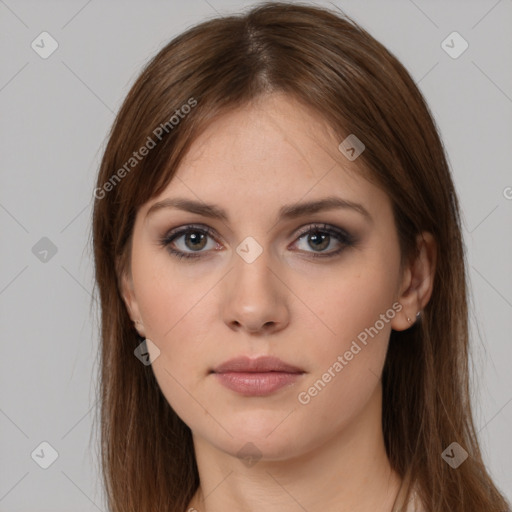 Neutral white young-adult female with long  brown hair and brown eyes