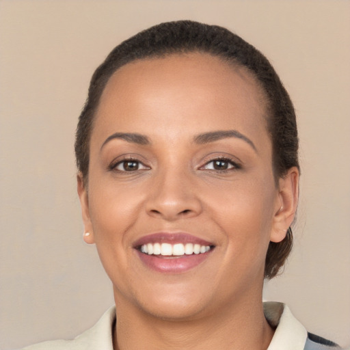 Joyful white young-adult female with short  brown hair and brown eyes