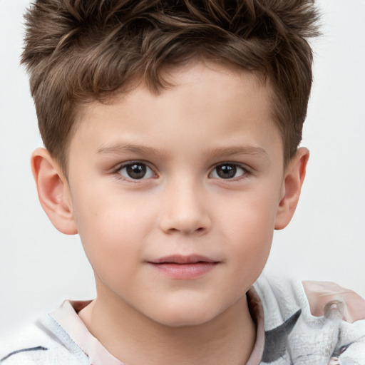 Joyful white child male with short  brown hair and brown eyes