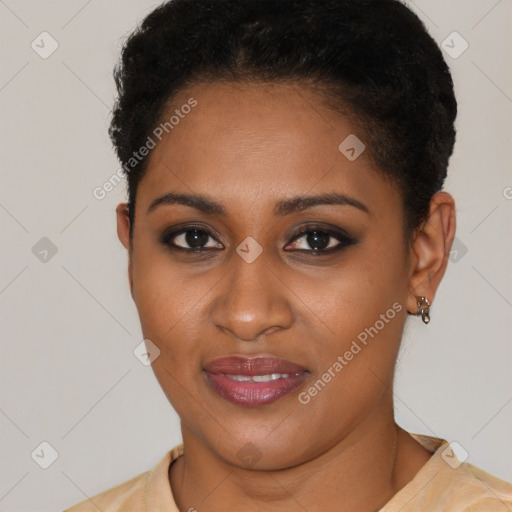 Joyful black young-adult female with short  brown hair and brown eyes