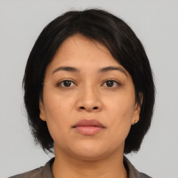 Neutral asian young-adult female with medium  black hair and brown eyes