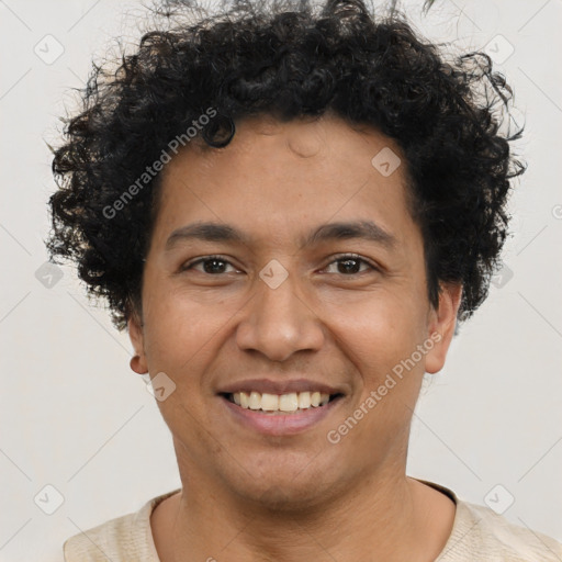 Joyful latino young-adult male with short  brown hair and brown eyes