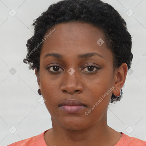 Neutral black young-adult female with short  brown hair and brown eyes