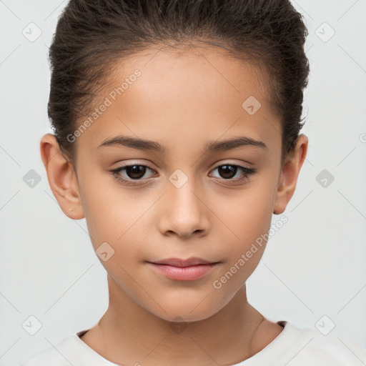 Joyful white child female with short  brown hair and brown eyes