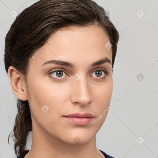 Neutral white young-adult female with medium  brown hair and brown eyes