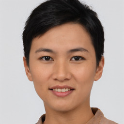 Joyful asian young-adult female with short  black hair and brown eyes