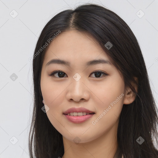 Joyful asian young-adult female with long  brown hair and brown eyes