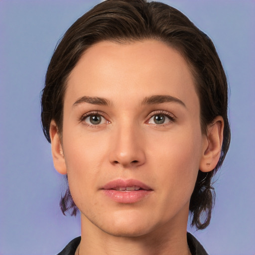 Neutral white young-adult female with short  brown hair and brown eyes