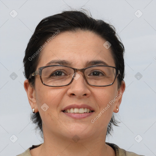 Joyful white adult female with medium  brown hair and brown eyes