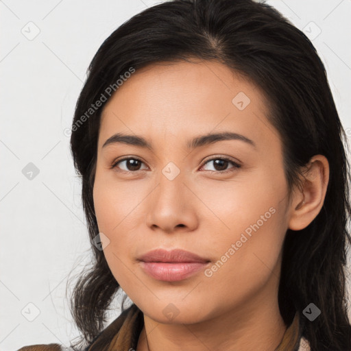 Joyful asian young-adult female with long  brown hair and brown eyes