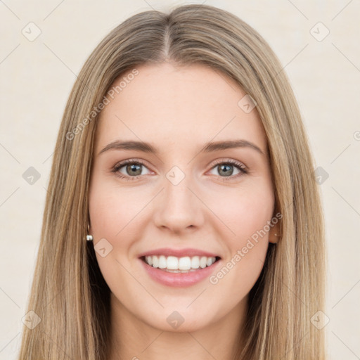 Joyful white young-adult female with long  brown hair and green eyes