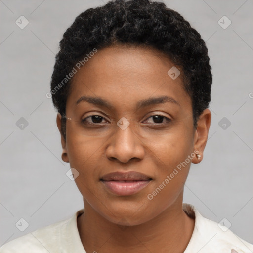 Joyful black young-adult female with short  black hair and brown eyes