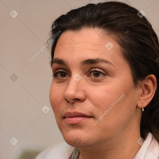 Joyful white adult female with medium  brown hair and brown eyes