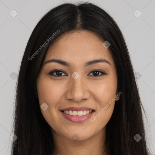 Joyful latino young-adult female with long  brown hair and brown eyes