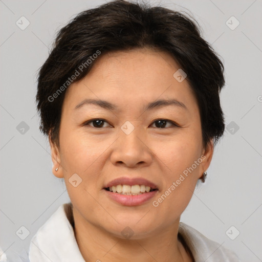 Joyful white adult female with short  brown hair and brown eyes