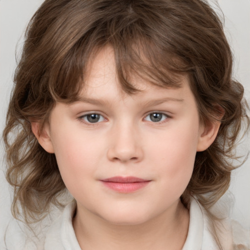 Joyful white child female with medium  brown hair and brown eyes