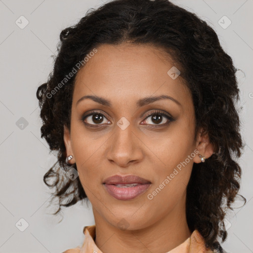 Joyful black young-adult female with medium  brown hair and brown eyes